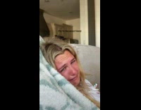 Lady Chuckles at Lady Cry on Sofa