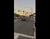 Man blue shirt turning street couch car