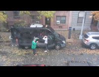 Man green jacket dance beside van street