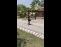 Two girls hold hands rollerblade street fail 