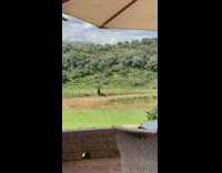 Woman in black top selfie video on the fields