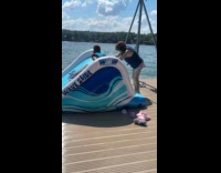 Woman run and falls on inflatable slide