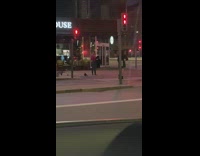 Girl black dress boots middle street night