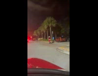 Art the Clown Santa walks on parking part 1