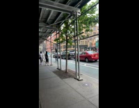 Collab WINY - Man rides bike with tire on  head 