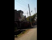 2 guys fall off motorcycle in the middle fo street 