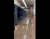 Rain water leak on subway station ceiling