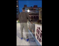 Man struggles to ice skate with girlfriend