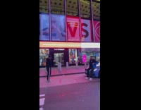 Man sit blue car photo shoot Tissot 