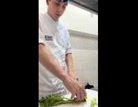 Cook chopping celery puts middle finger up