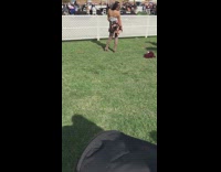 Woman white tube top floral skirt track