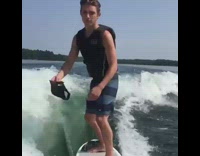 Guy on wakeboard throws hat falls fail 
