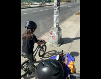 Kid bikes into street lamp 