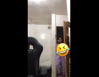 Guy jump scares friend with cardboard cutout of guys head