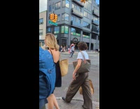 Collab winy - Man balancing tire on head while on bike 