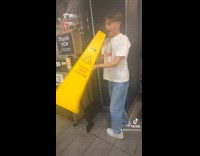 Collab Clips MPUGC - Man uses wet floor cone as megaphone 