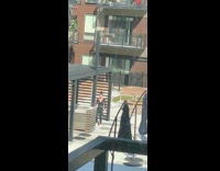 Girl black attire dance tiktok empty courtyard