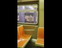 Man puts hands on hips and shakes butt in a circle on subway station