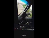 Cat stares at girl watching cat videos 