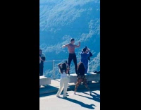 Collab IITW - Man shirtless flexes muscle at Fjord Viewpoint