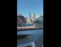 Guy Lifts Barrier on Bridge so Cars can Pass 