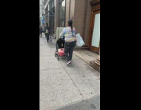 Man in white tarp jesus costume dances in subway station