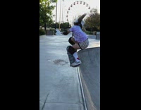 Little girl attempts skateboard trick multiple times 