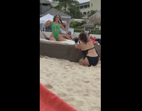 Woman in green swimsuit dances 