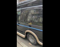 Model boats and ships inside black van