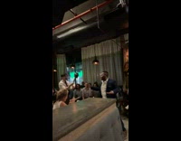 Man Holds Up Hammer and Charges Ahead