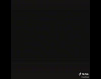 Fox climb over black rabbit cage backyard