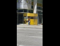 Orange shirt girl yolk restaurant yellow canopy 