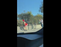 Woman short santa dress twerk street railings