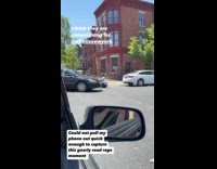 Man with kid drive small cybertruck street