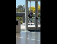 Man dance video shoot outside coffee shop