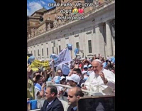 Pope Francis parading at childrens festival