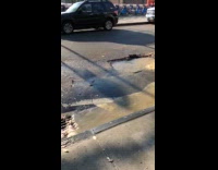 Brown water rise from street flow into sewer
