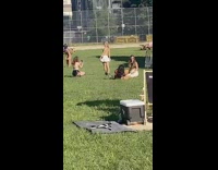 Two group of women photoshoots near big pink balls