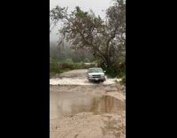 Collab SendItOfficiall - Pickup Truck Crosses River with People on Board
