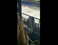 Girl takes selfie at ice rink