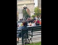 Guy with white face paint dances