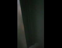 Girl closes window when storm gets stronger 