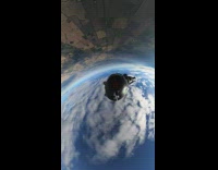 POV gopro angle from skydivers helmet as guy is skydiving 
