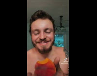 Guy speaks in cursive while eating peach 