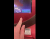 Red machine engraves blue dog tag guy