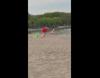 Girl red bikini twerk beach kid nearby