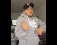 Man gray nike sweater dances to Ice Age song 