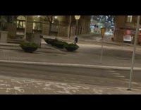 Man dance middle street night yellow triangle