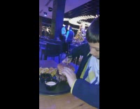 Boy grabs big burger and reacts after tasting