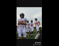 Girl plays football and models fashion show 